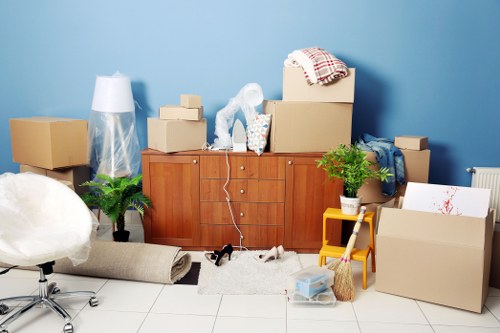 Compact removal vehicle loading household items for a local move
