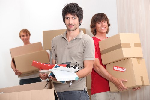 Packing and labeling items for household storage in Bow
