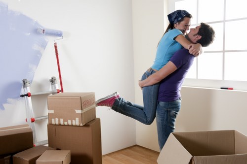 A student moving items into a storage unit in Bow