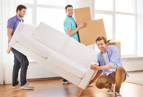 Person safely moving boxes at a storage facility entrance