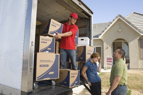 Stacked storage boxes and clear walkway inside a unit