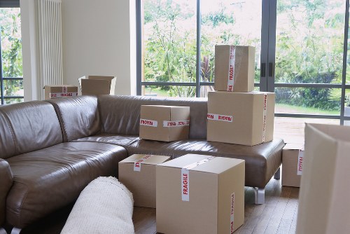 Organised moving and storage service in Bow with carefully packed boxes and furniture